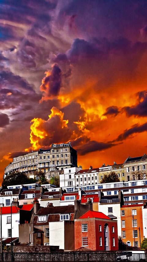 fiery sky town purple orange wallpaper background phone