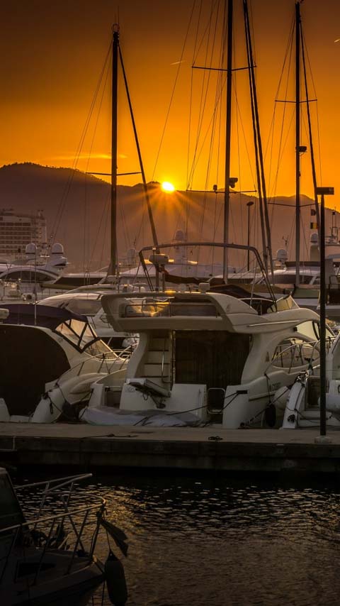 motorboat sunset ocean wallpaper background phone